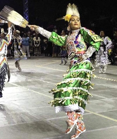 Acosia Red Elk competes at the Gathering of Nations powwow in Albequerque, New Mexico. Red Elk won the Jingle Dancing division for the eighth time.