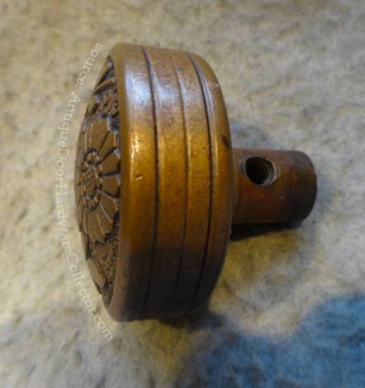 Side View: Antique Flower Door Knob Made by Russell & Erwin - source: AntiqueDoorHardwareCollector.com