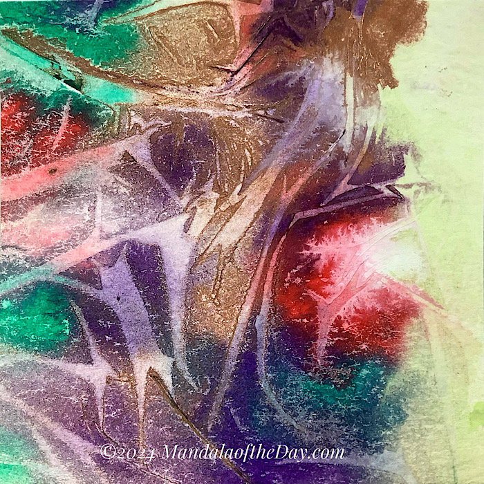 abstract background of greens, reds, purple, and gold