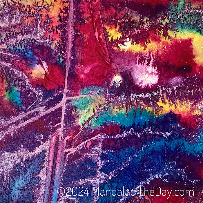 intense abstract background of rainbow colors with some grayish-pink electrified lines throughout.
