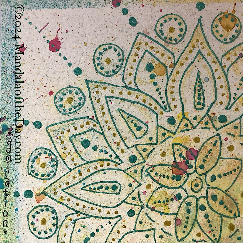 24-225 Admiration — After. abstract textured background with colors of yellow, green, blue, beige, and off-white. There’s also a hint of an outline from a mandala stencil. on top in metallic turquoise ink is an outline of a mandala based on the partial mandala stencil in the background. Lines of dots of metallic turquoise and gold fill in much of the outline as well as extending outward from the petal tips.