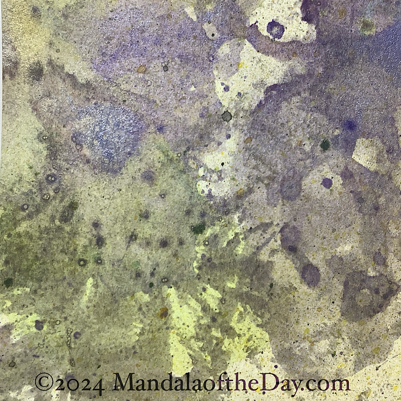 MotD 24-244 Giving Back — Before. Abstract textured background in variations of light green. on top is a glaze of metallic purple and green ink.