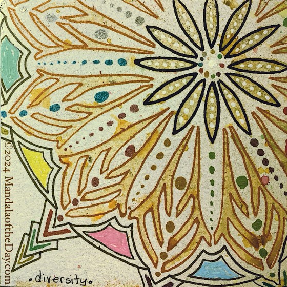 MotD 24-250 Diversity — After. abstract textured background with microdots of colors. stenciled on top is a partial mandala in pale oranges, browns, and sepia…the center of the stenciled mandala is up and to the right. on top, copper ink is used to outline the outer portions of the stenciled mandala. black ink is used to outline the inner daisy-like petals. Metallic black is used to add a compatible design to the outer edge.Different color dots are used throughout.