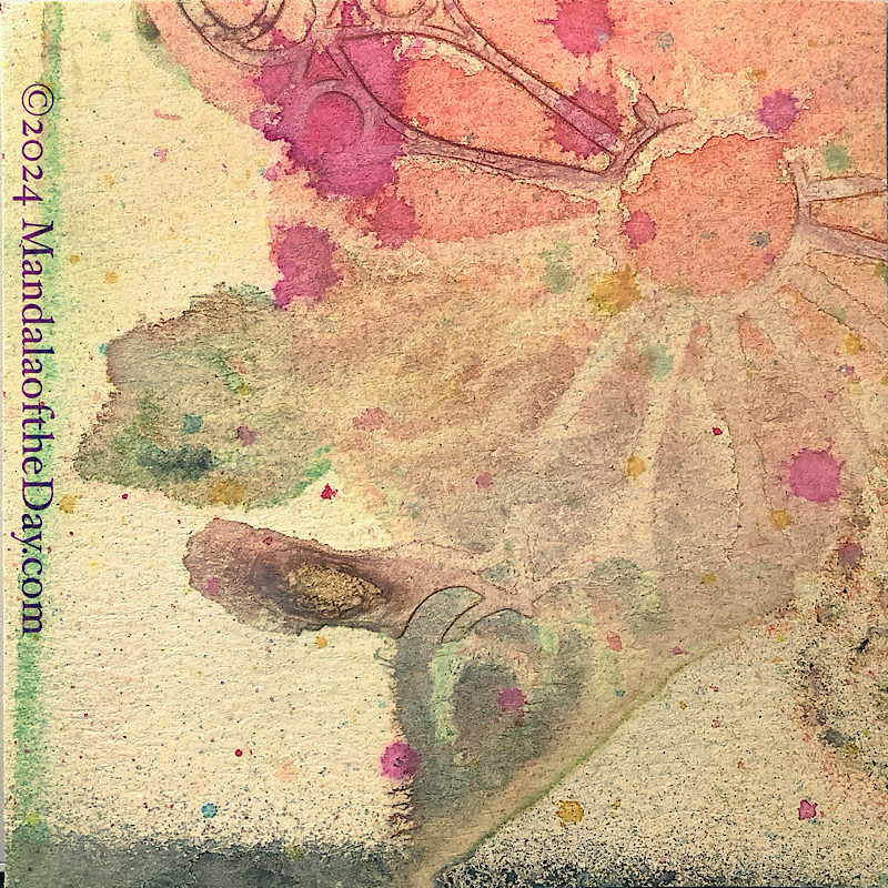 MotD 24-255 Usefulness — Before. textured abstract background of pale yellow with multi-color microdots of colors. in the upper right corner down to the center is a not-so-clearly-defined stenciled mandala with colors of peach, brown, muted dark greens, and blobs of magenta.