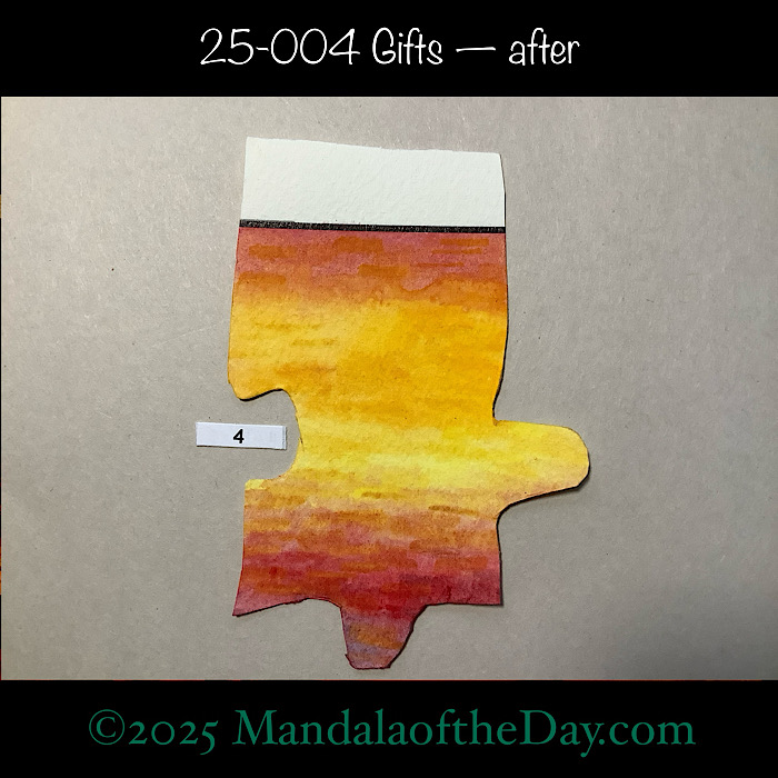 MotD 25-004 Gifts — after. Front of puzzle piece #4. painted with warm gradient colors of yellow, marigold, orange, and red.