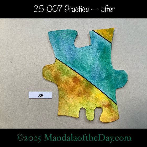 MotD 25-007 Practice — After. Puzzle Piece No. 85. painted with colors of blue/green and yellow/brown/green