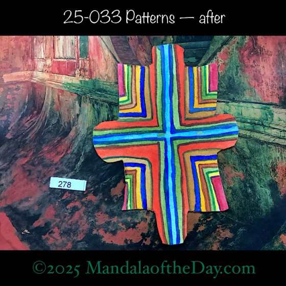 MotD 25-033 Patterns — after. Painted front side Puzzle Piece No. 278. with striped colors of red, yellow, green, blue, and browns.