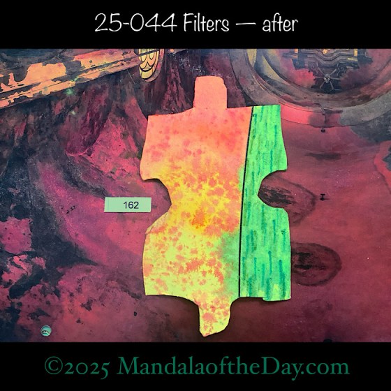 MotD 25-044 Filters — after. Painted front view of Puzzle Piece No. 162. with colors of yellow, orange, red, and greens