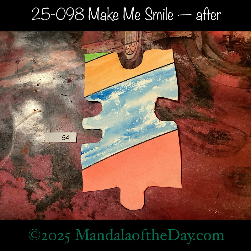 MotD 25-098 Make Me Smile — after. painted front side of Puzzle Piece No. 54 with colors of warm red, warm peach, green, and blue & white