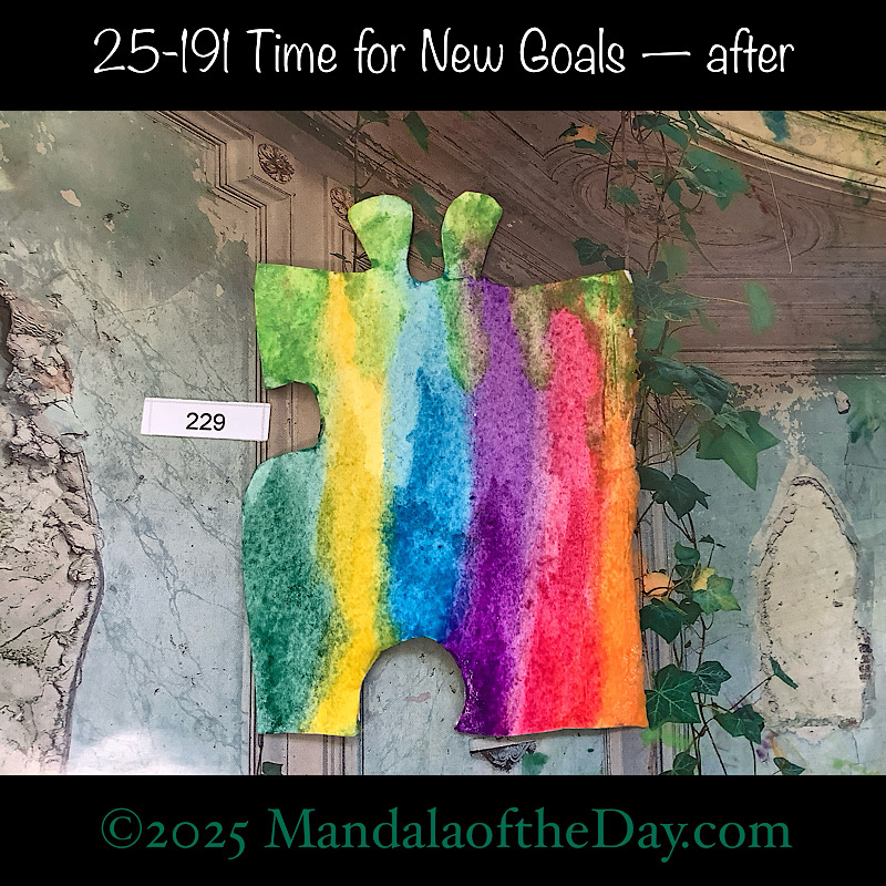 Mandala of the Day 25-191 Time for New Goals — after. painted front side of Puzzle Piece No. 229 with stripe colors of orange, magenta, purple, blue, yellow, and green.