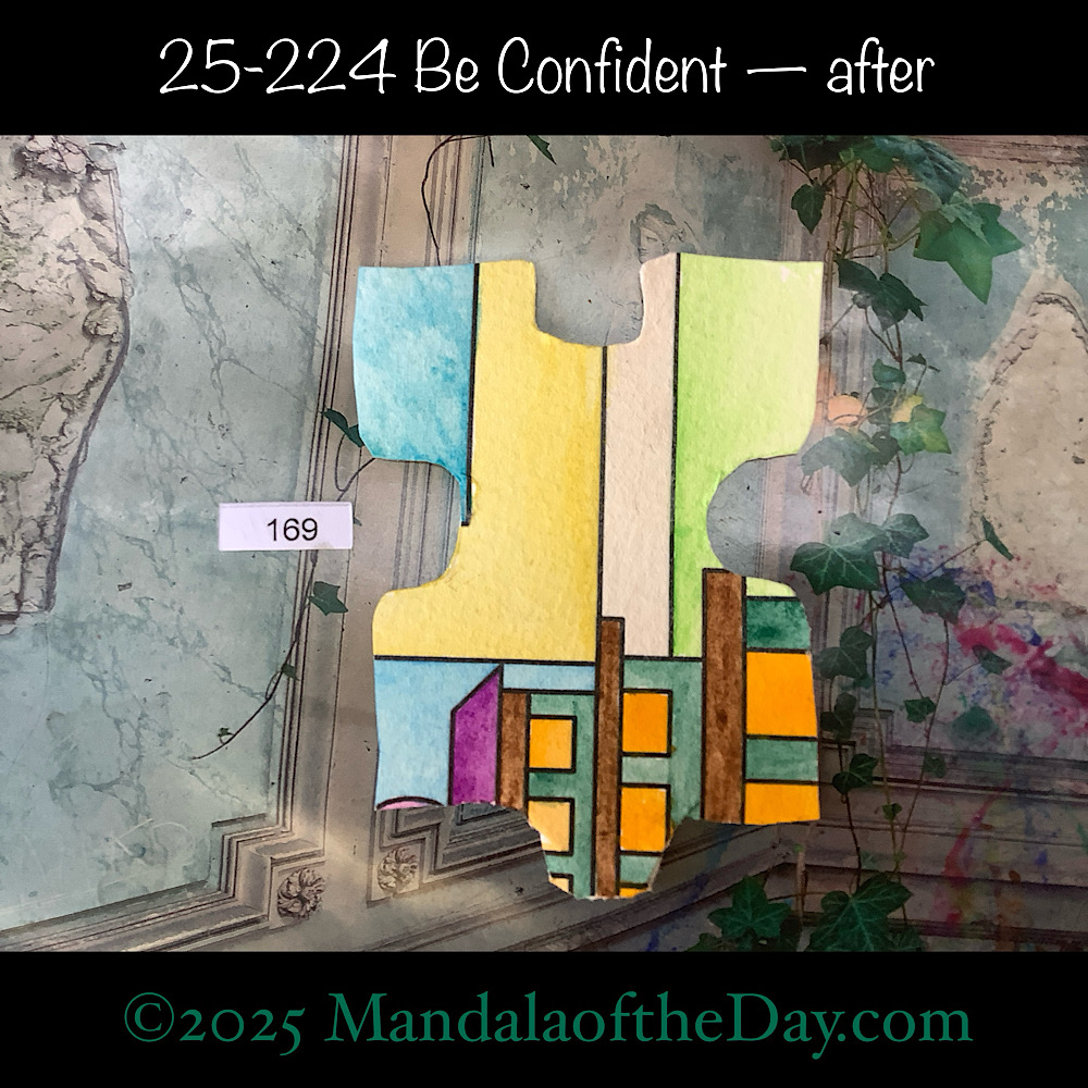 Mandala of the Day 25-224 Be Confident — after. painted front side of Puzzle Piece No. 169 with colors of orange, yellow, white, greens, blues, and brown